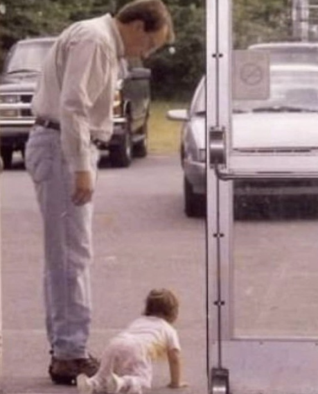 Jay and baby Abigail crawling